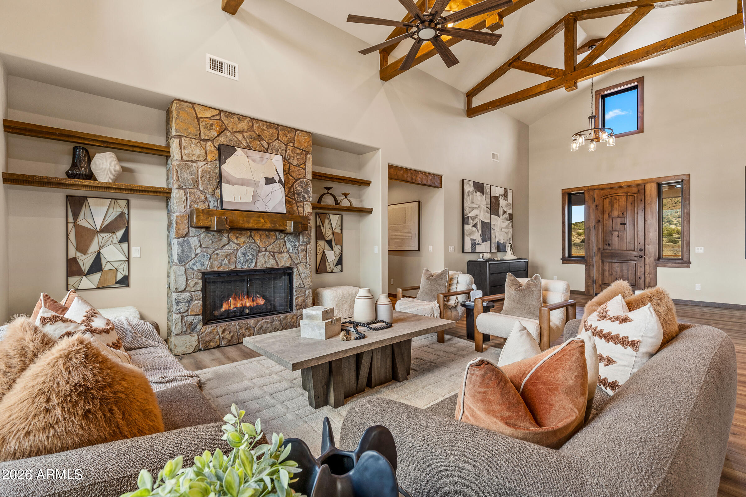 6570 Meadows Lane Flagstaff, AZ 86004 - Photo 6 of 66 a living room with furniture and a fireplace