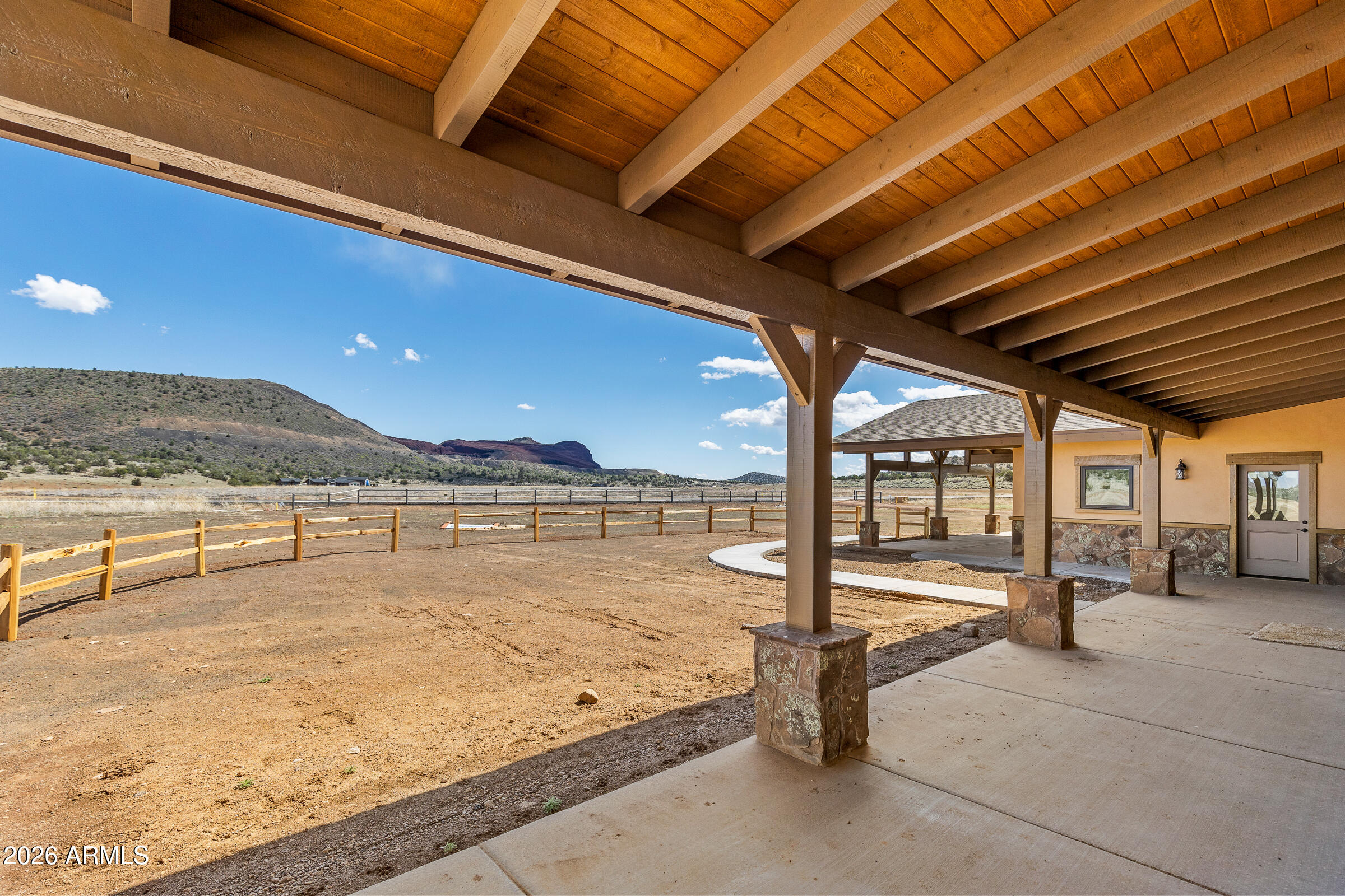 6570 Meadows Lane Flagstaff, AZ 86004 - Photo 7 of 66 a view of a swimming pool with a lawn chairs