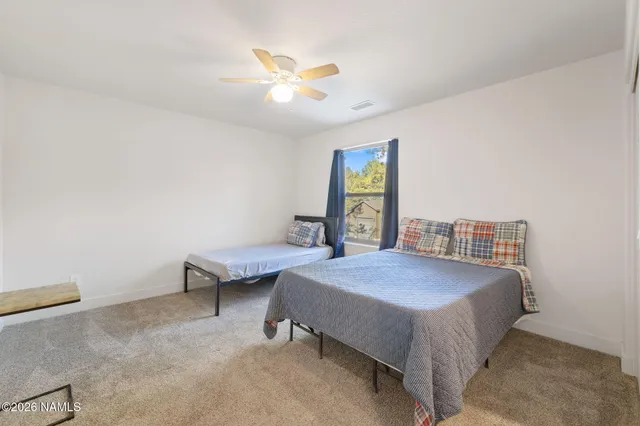 a view of a swimming pool with an ocean view