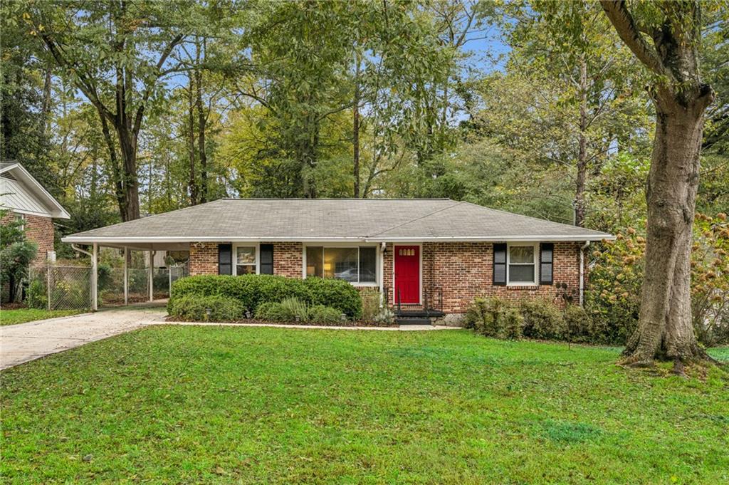 2588 Wood Trail Lane Decatur, GA 30033 - Photo 1 of 1 a view of a house with garden and yard