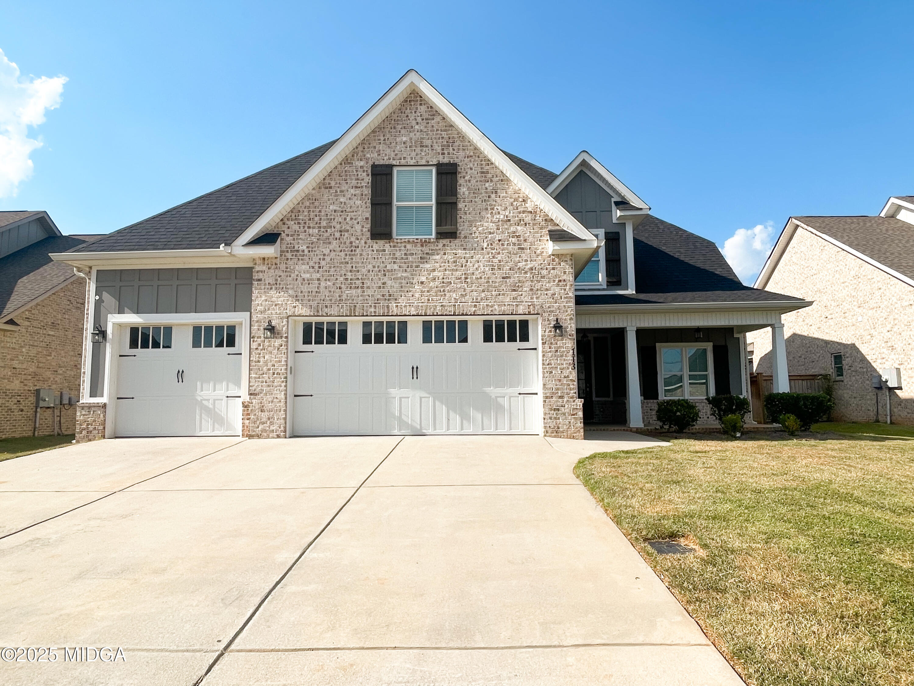 113 Perth Court Warner Robins, GA 31088 - Photo 1 of 28 a front view of a house with a yard