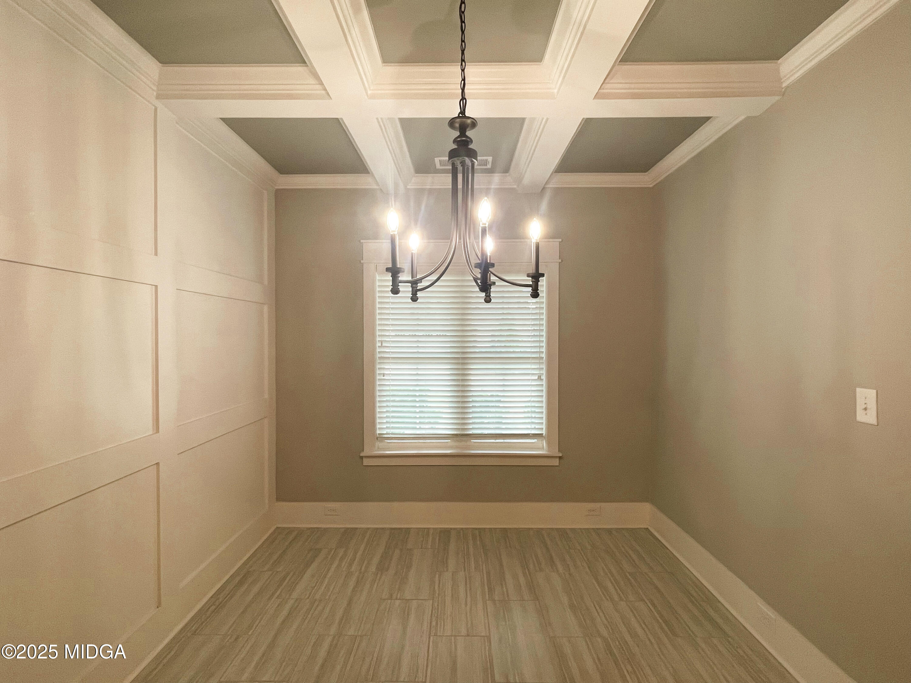 113 Perth Court Warner Robins, GA 31088 - Photo 11 of 28 a view of empty room with wooden floor and fan
