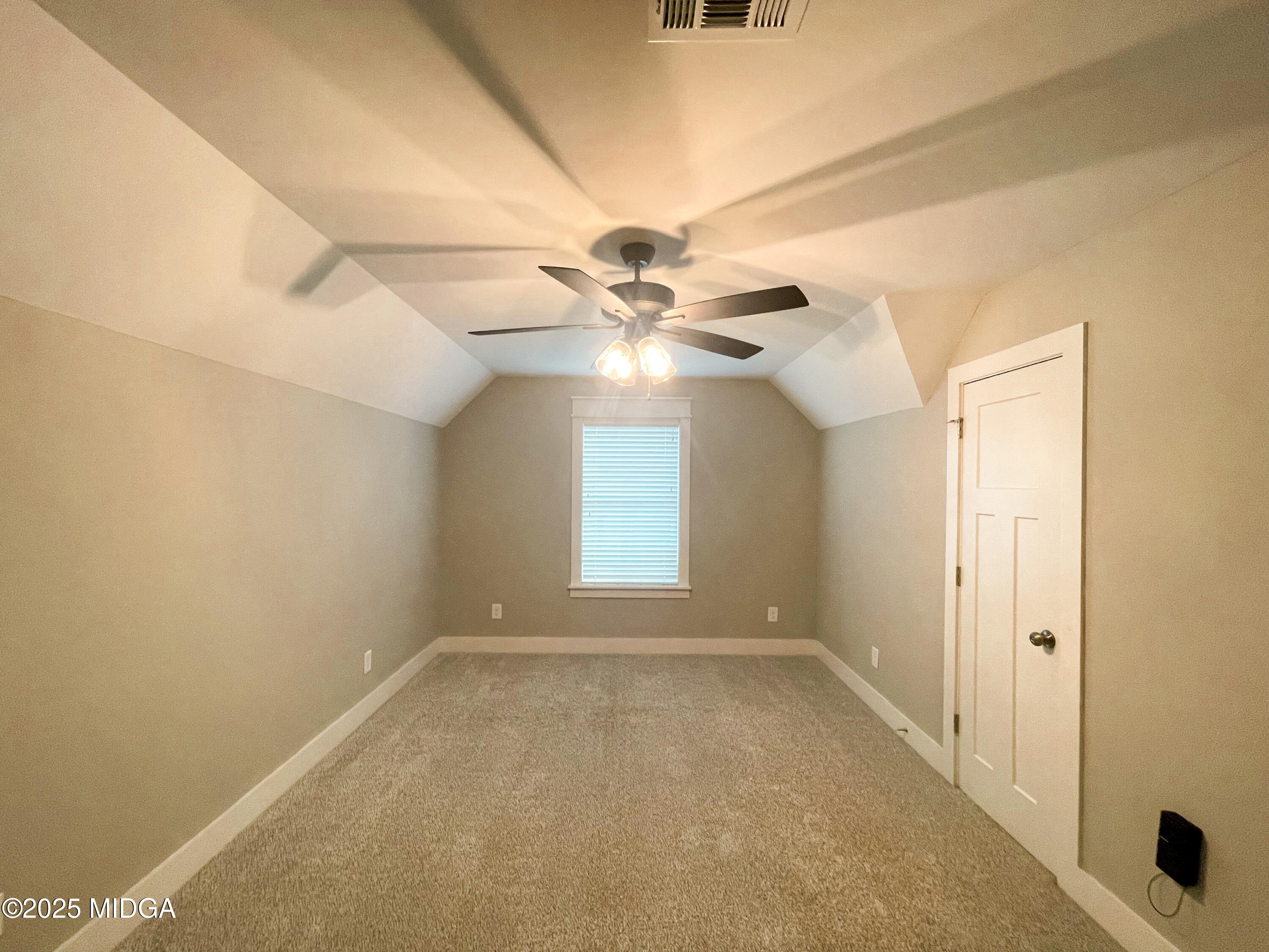 113 Perth Court Warner Robins, GA 31088 - Photo 22 of 28 a view of an empty room with a window