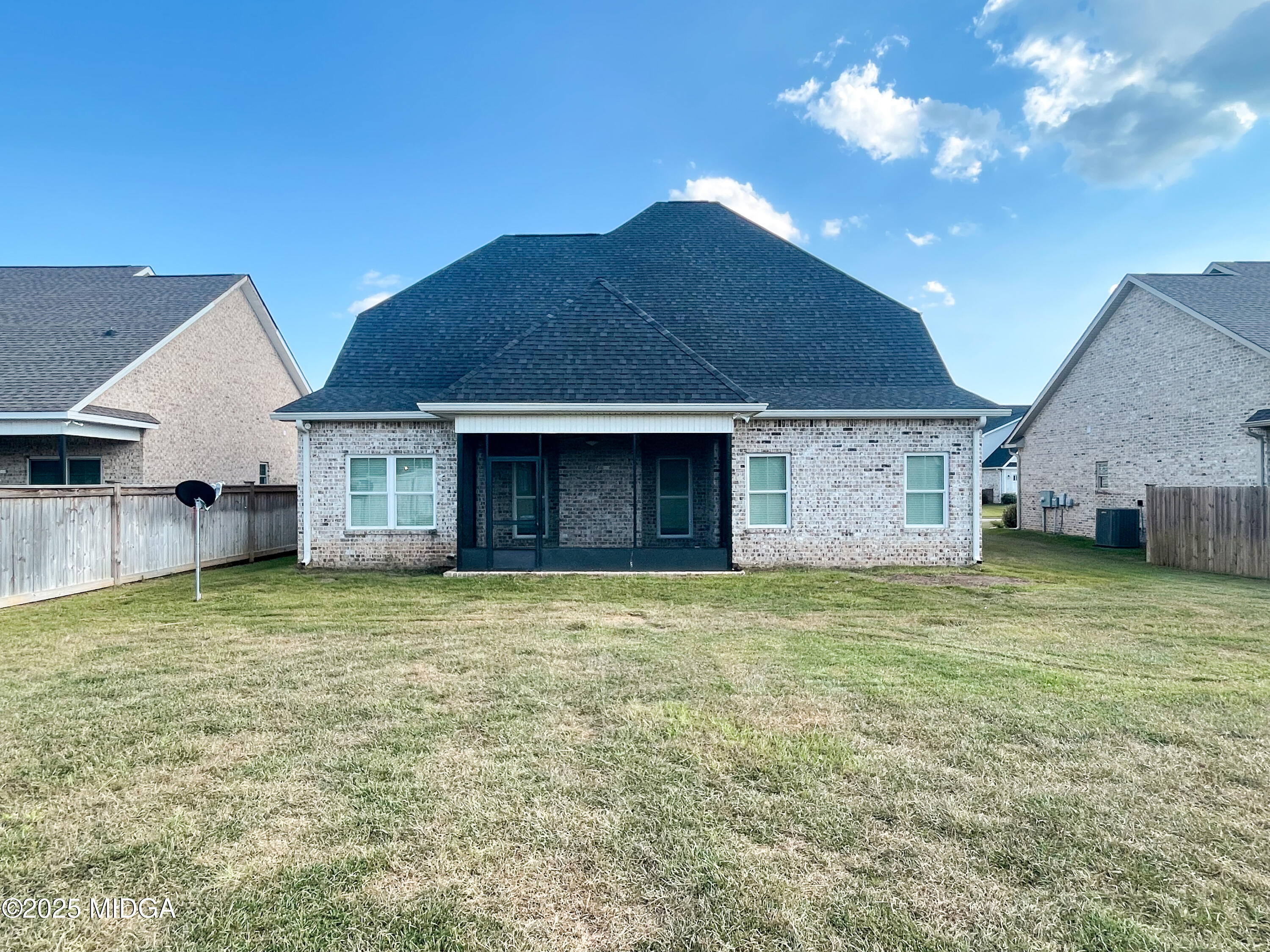 113 Perth Court Warner Robins, GA 31088 - Photo 25 of 28 a view of a house with a yard and garage