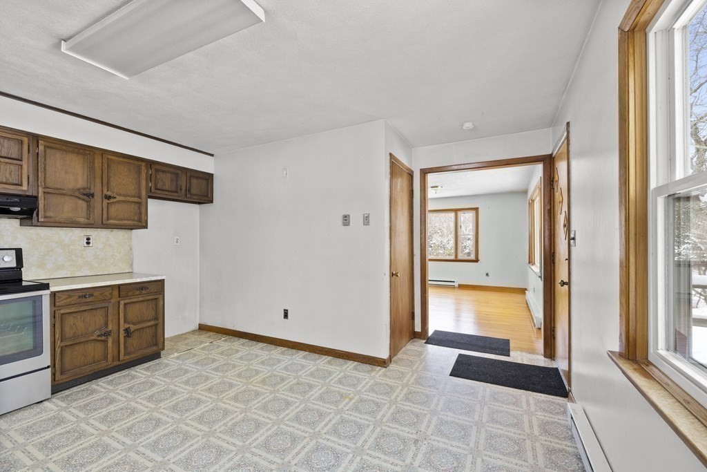 44 Sumner Street Gloucester, MA 01930 - Photo 12 of 40 a view of a kitchen with a sink dishwasher and cabinets