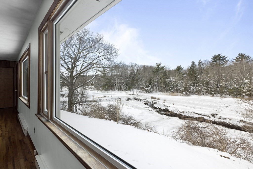 44 Sumner Street Gloucester, MA 01930 - Photo 15 of 40 a view of a yard with a snow on the wall