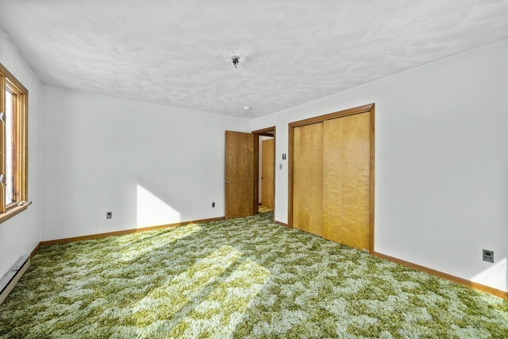 44 Sumner Street Gloucester, MA 01930 - Photo 18 of 40 a view of room with window and ceiling fan