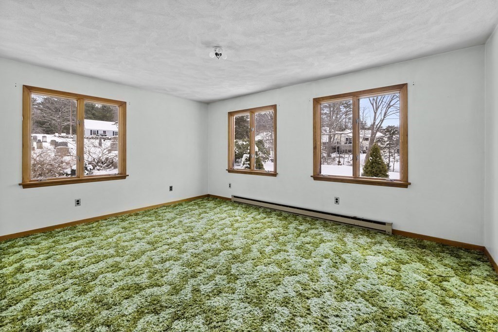 44 Sumner Street Gloucester, MA 01930 - Photo 19 of 40 a view of an empty room with window