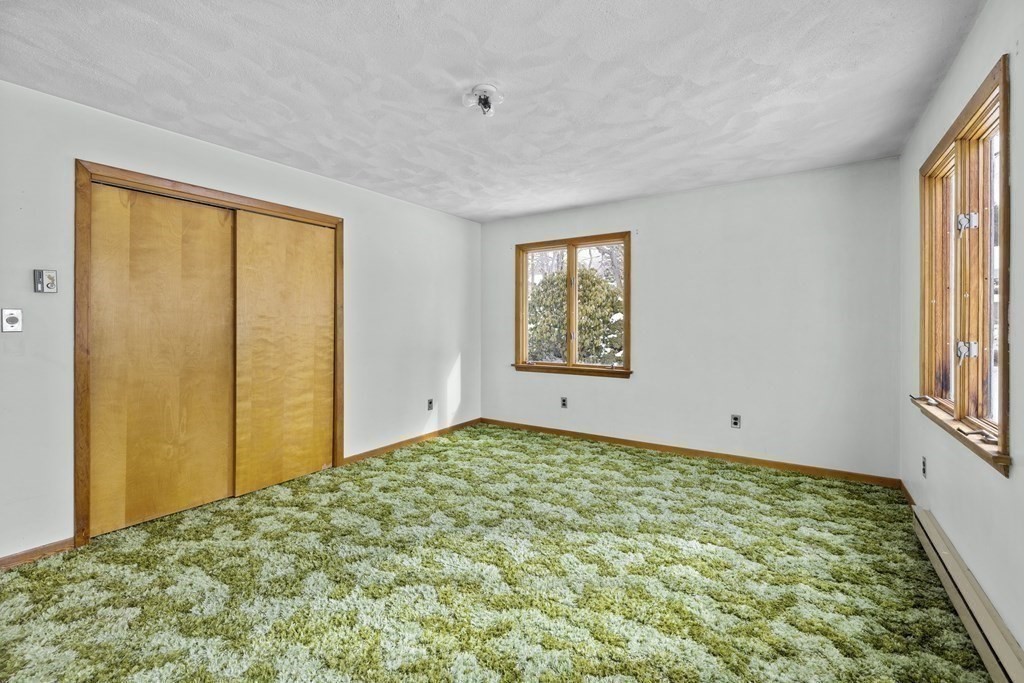 44 Sumner Street Gloucester, MA 01930 - Photo 21 of 40 a view of an empty room and a window