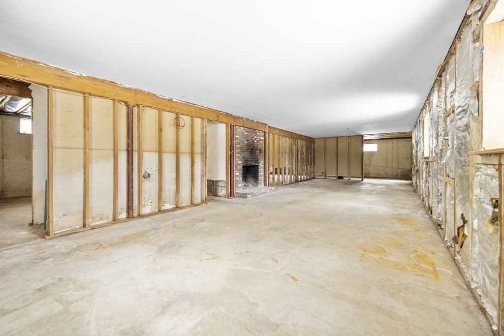 44 Sumner Street Gloucester, MA 01930 - Photo 30 of 40 a view of an empty room with a window