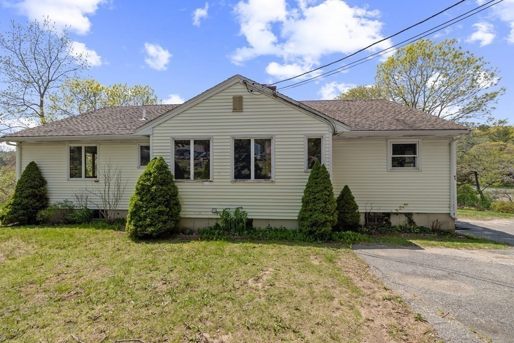 44 Sumner Street Gloucester, MA 01930 - Photo 35 of 40 a view of a house with a yard
