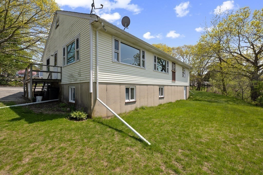 44 Sumner Street Gloucester, MA 01930 - Photo 37 of 40 a front view of house with yard