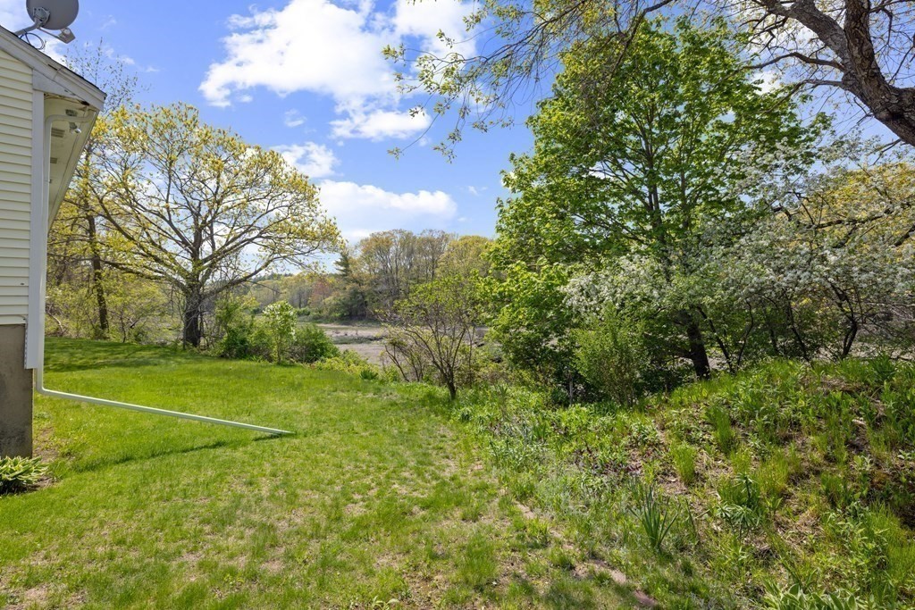 44 Sumner Street Gloucester, MA 01930 - Photo 38 of 40 a view of a field with plants and trees