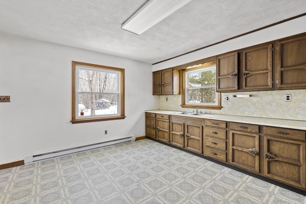 44 Sumner Street Gloucester, MA 01930 - Photo 9 of 40 an empty room with windows