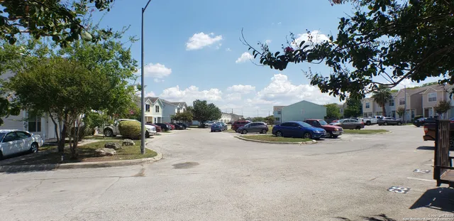 a view of a street with cars