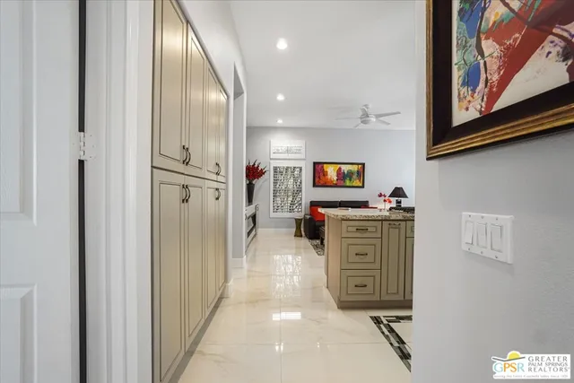 a view of living room with furniture and flat screen tv
