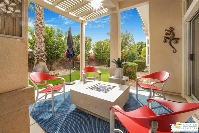 a outdoor space with patio the couches and a dining table with garden view