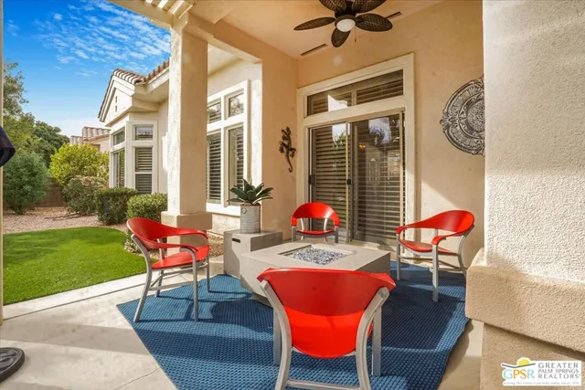 a dining room with furniture and window