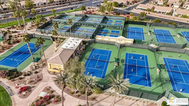 an aerial view of residential building and parking space