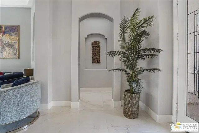 a potted plant sitting next to a bathroom
