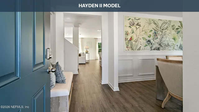 a kitchen with a sink and a refrigerator