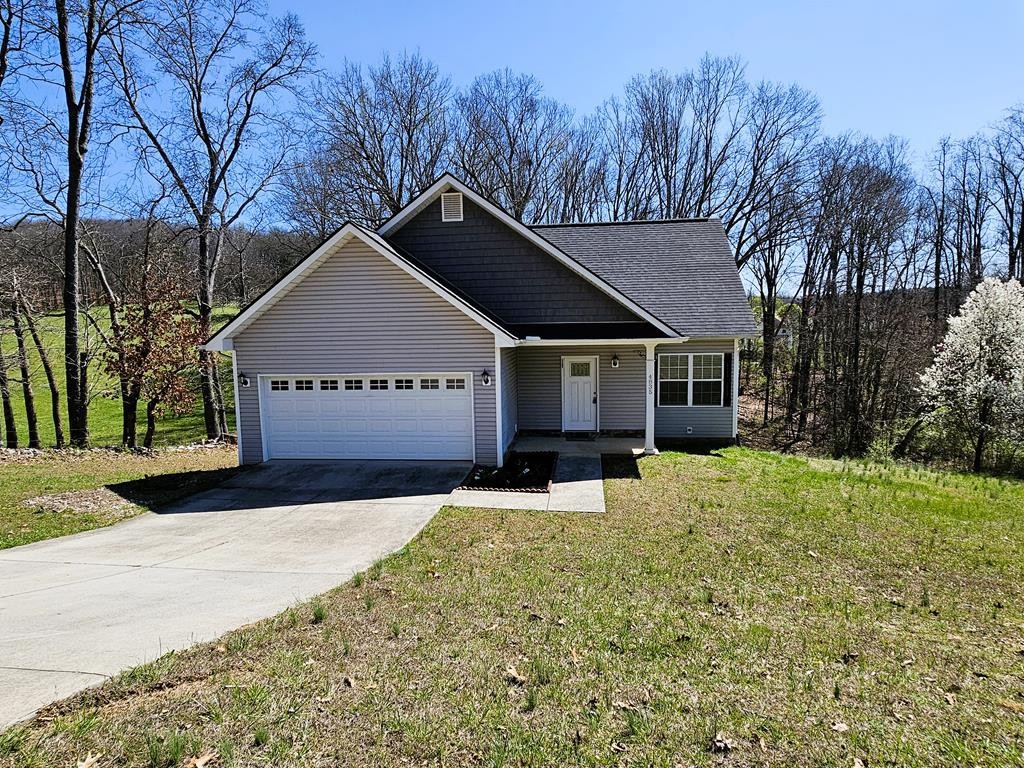 4835 Cameron Road Morristown, TN 37814 - Photo 1 of 25 a view of a house with a yard covered in snow