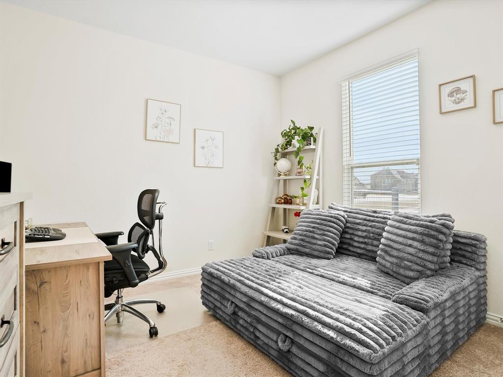 173 Mdw Vista Drive Rhome, TX 76078 - Photo 22 of 40 a bedroom with a bed and a window