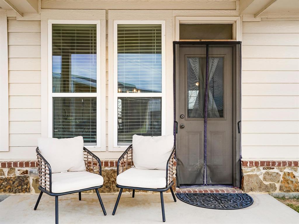 173 Mdw Vista Drive Rhome, TX 76078 - Photo 28 of 40 a view of a room with a table and chairs