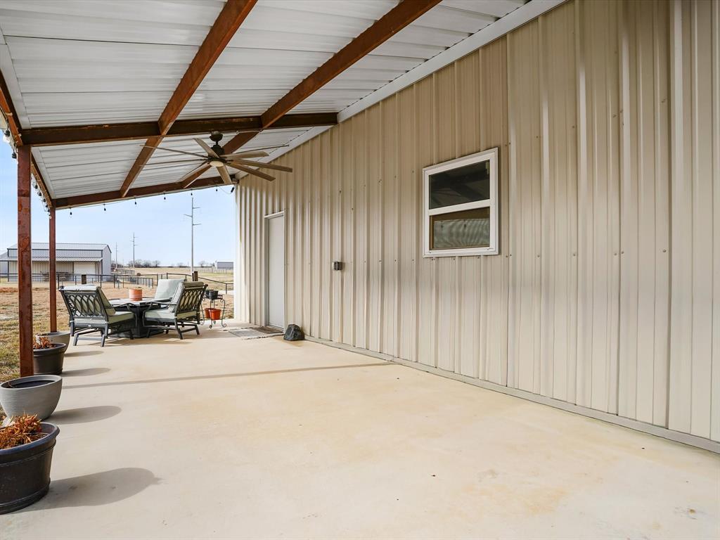 173 Mdw Vista Drive Rhome, TX 76078 - Photo 34 of 40 a car parked in front of garage