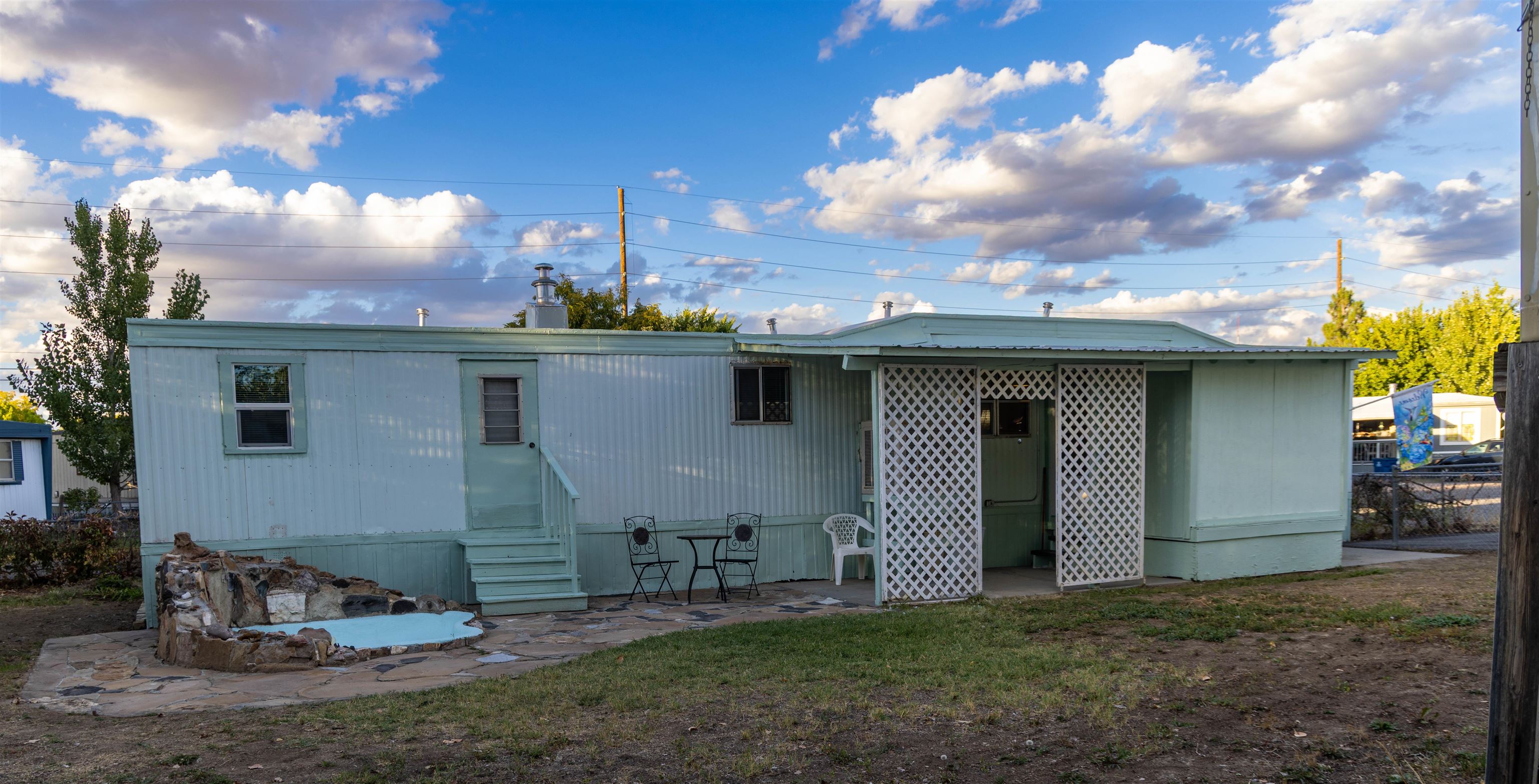 585-25 25 1/2 Road, Unit 232 Grand Junction, CO 81505 - Photo 1 of 40 a view of a patio with a table and chairs