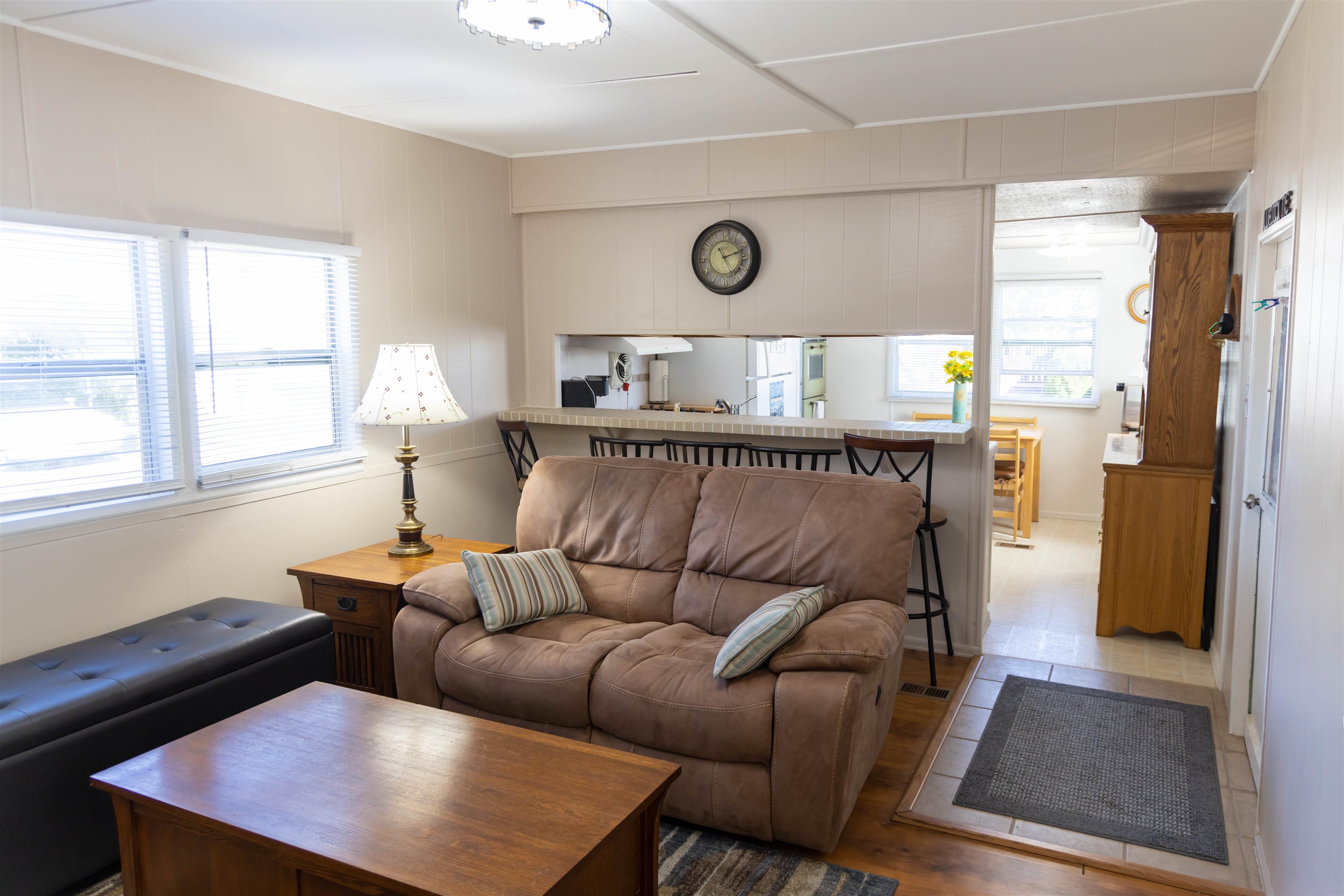 585-25 25 1/2 Road, Unit 232 Grand Junction, CO 81505 - Photo 17 of 40 a living room with furniture and a window