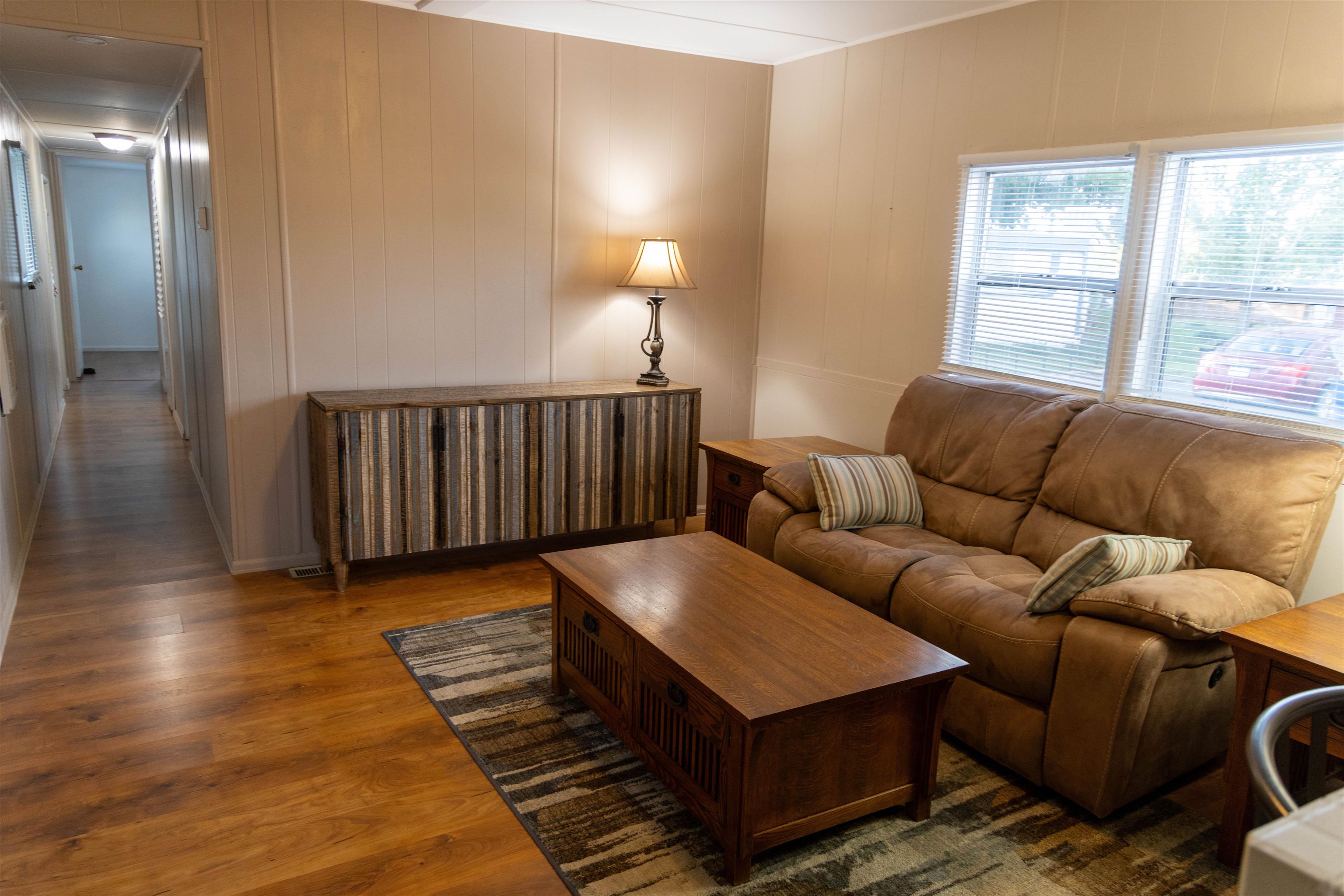 585-25 25 1/2 Road, Unit 232 Grand Junction, CO 81505 - Photo 20 of 40 a living room with furniture and a window