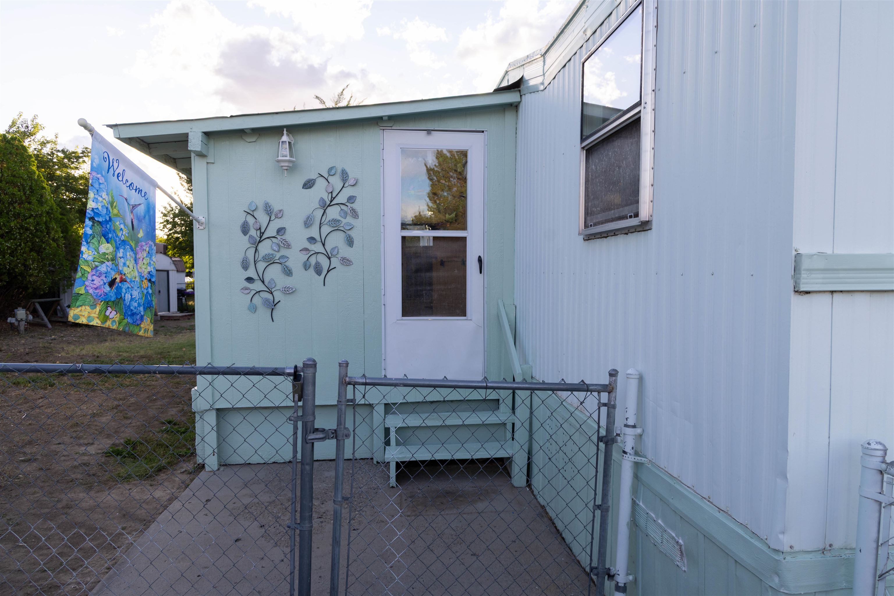 585-25 25 1/2 Road, Unit 232 Grand Junction, CO 81505 - Photo 2 of 40 a house view with a wooden door and deck