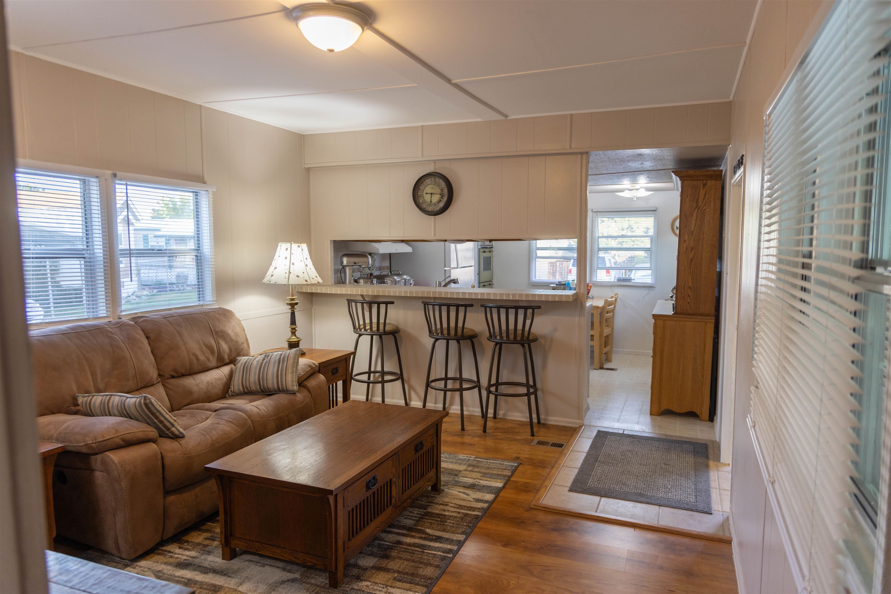 585-25 25 1/2 Road, Unit 232 Grand Junction, CO 81505 - Photo 22 of 40 a living room with furniture and a table