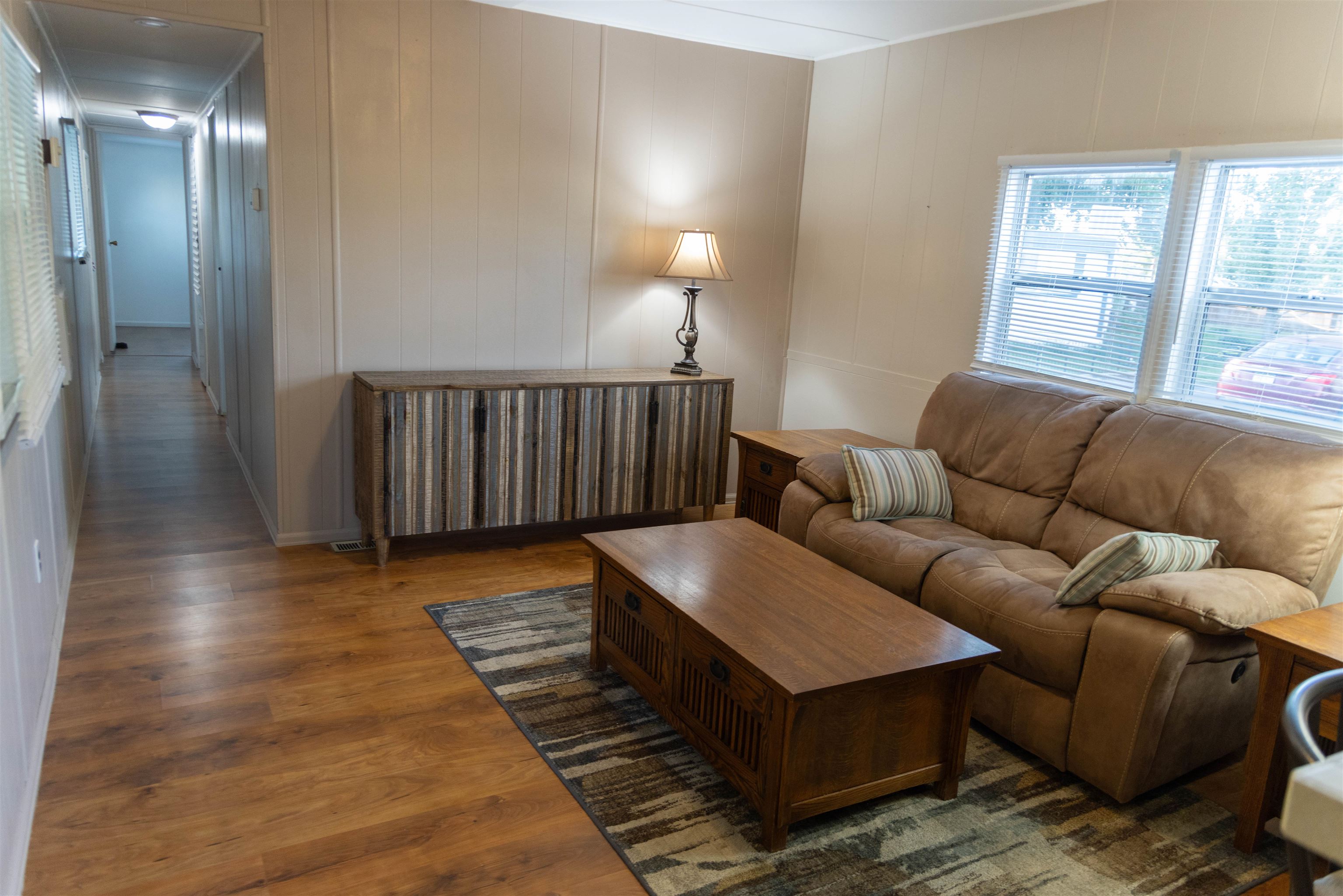 585-25 25 1/2 Road, Unit 232 Grand Junction, CO 81505 - Photo 23 of 40 a living room with furniture and a rug