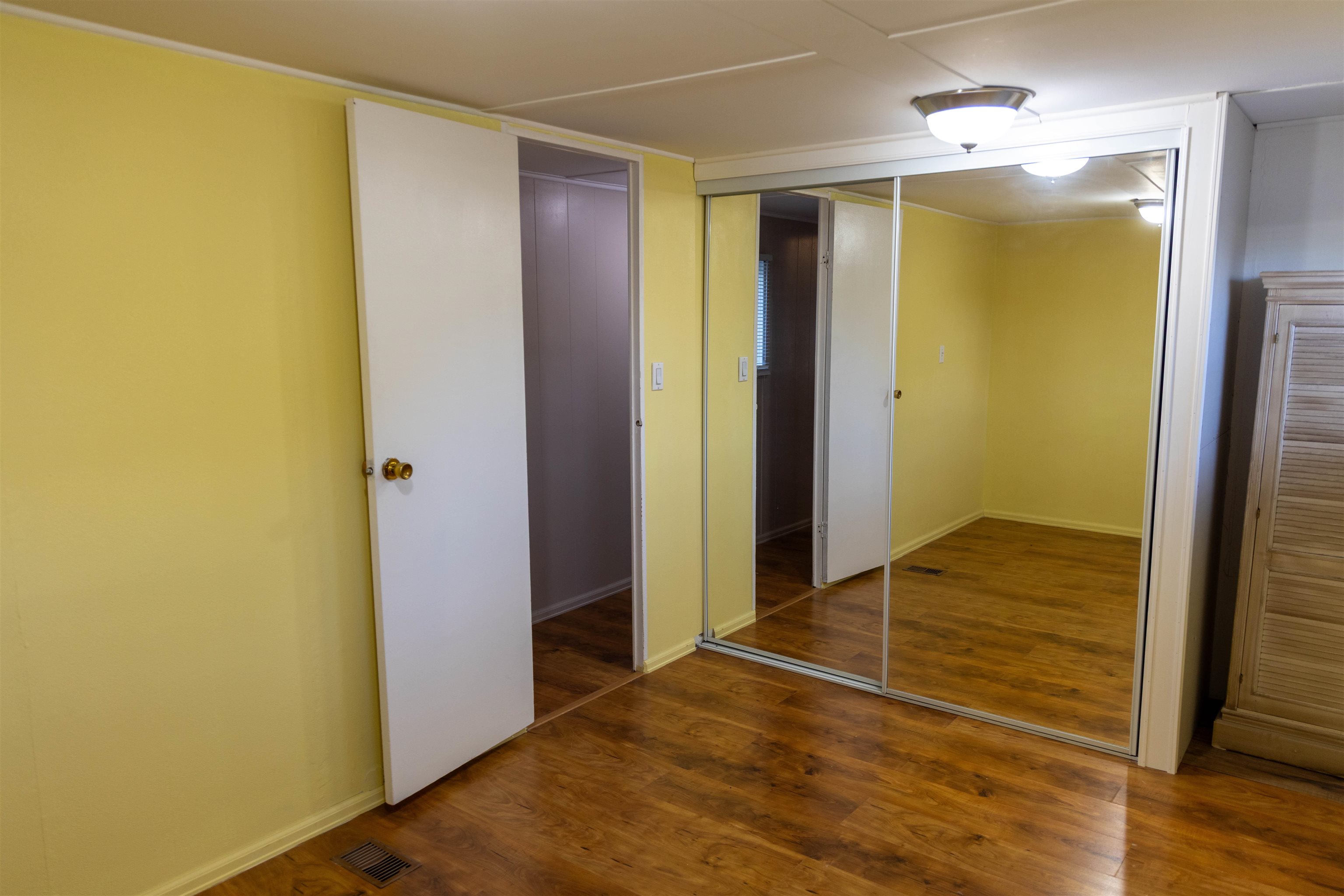585-25 25 1/2 Road, Unit 232 Grand Junction, CO 81505 - Photo 26 of 40 a view of an empty room with closet and a window