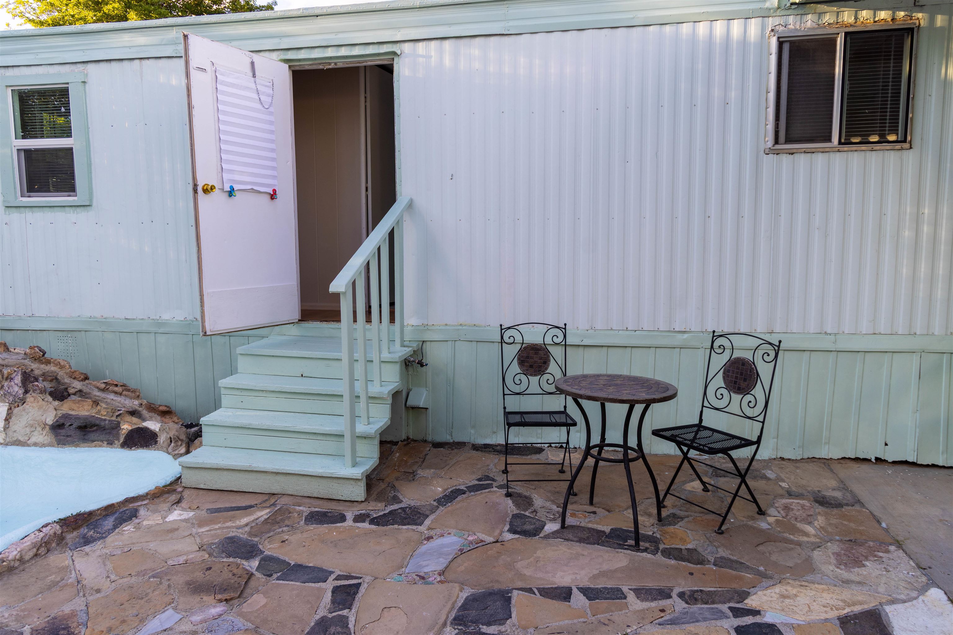 585-25 25 1/2 Road, Unit 232 Grand Junction, CO 81505 - Photo 38 of 40 a view of two chairs in the patio