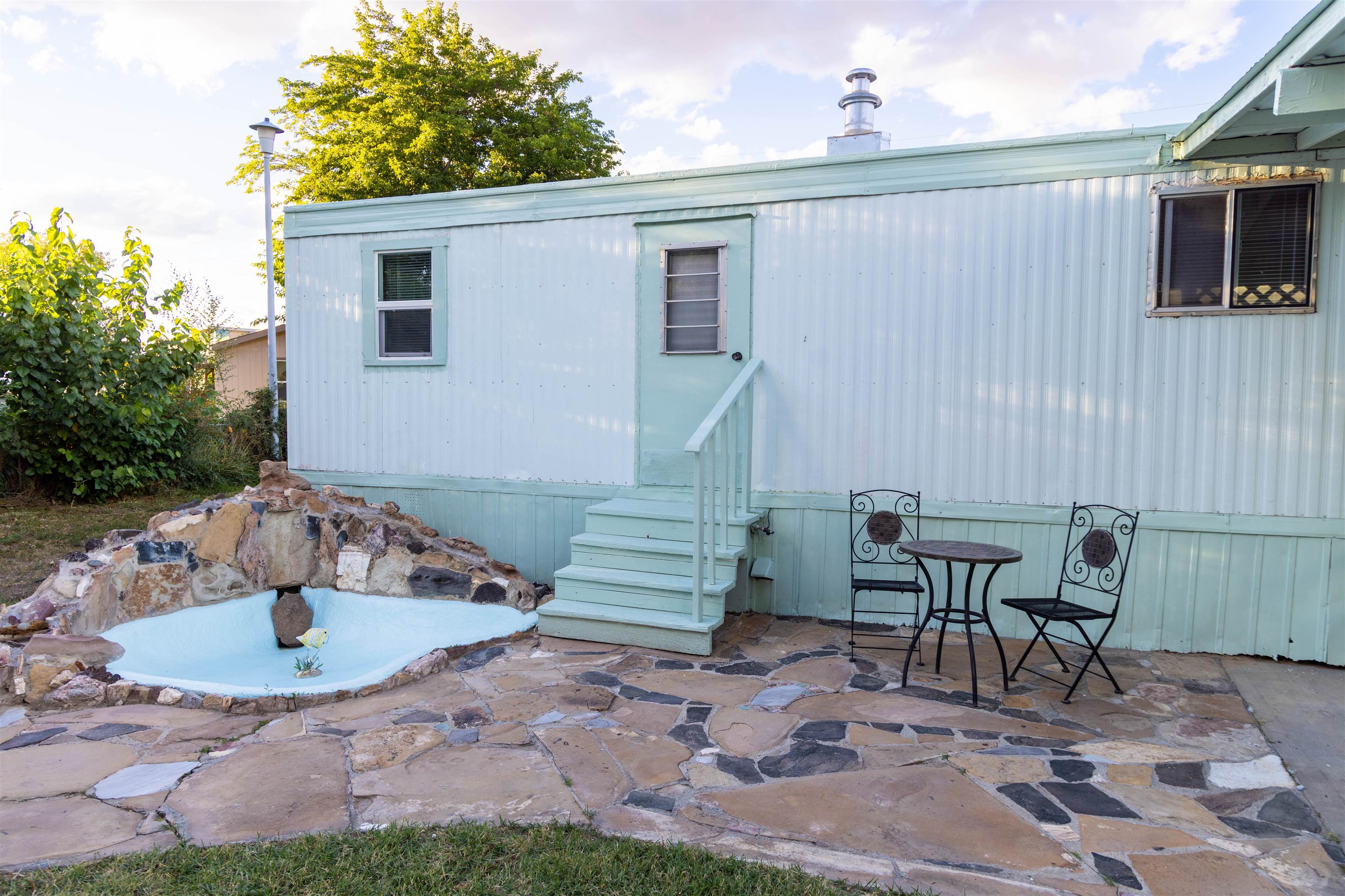 585-25 25 1/2 Road, Unit 232 Grand Junction, CO 81505 - Photo 39 of 40 a view of a backyard with table and chairs