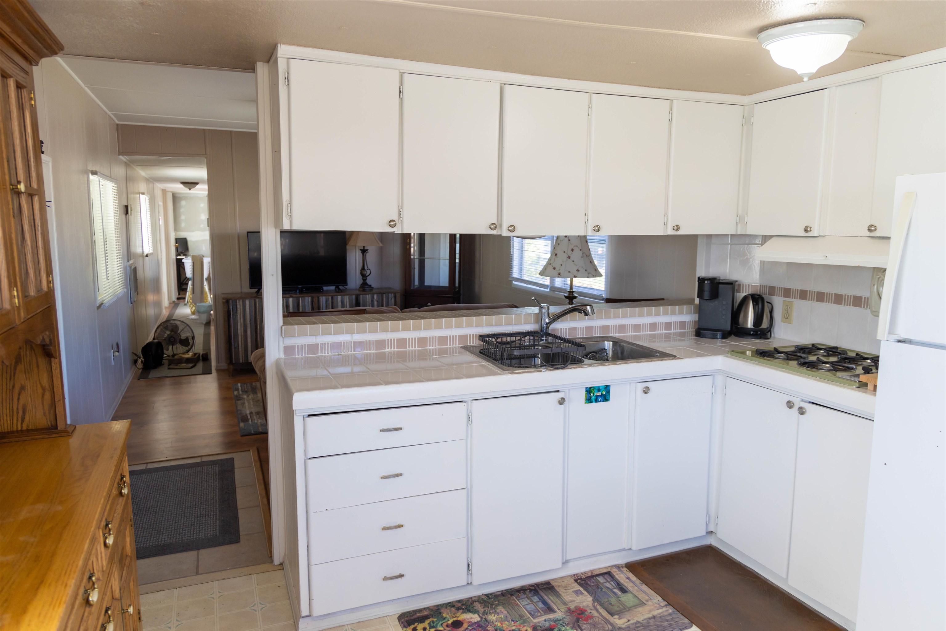 585-25 25 1/2 Road, Unit 232 Grand Junction, CO 81505 - Photo 8 of 40 a kitchen with a sink cabinets and appliances