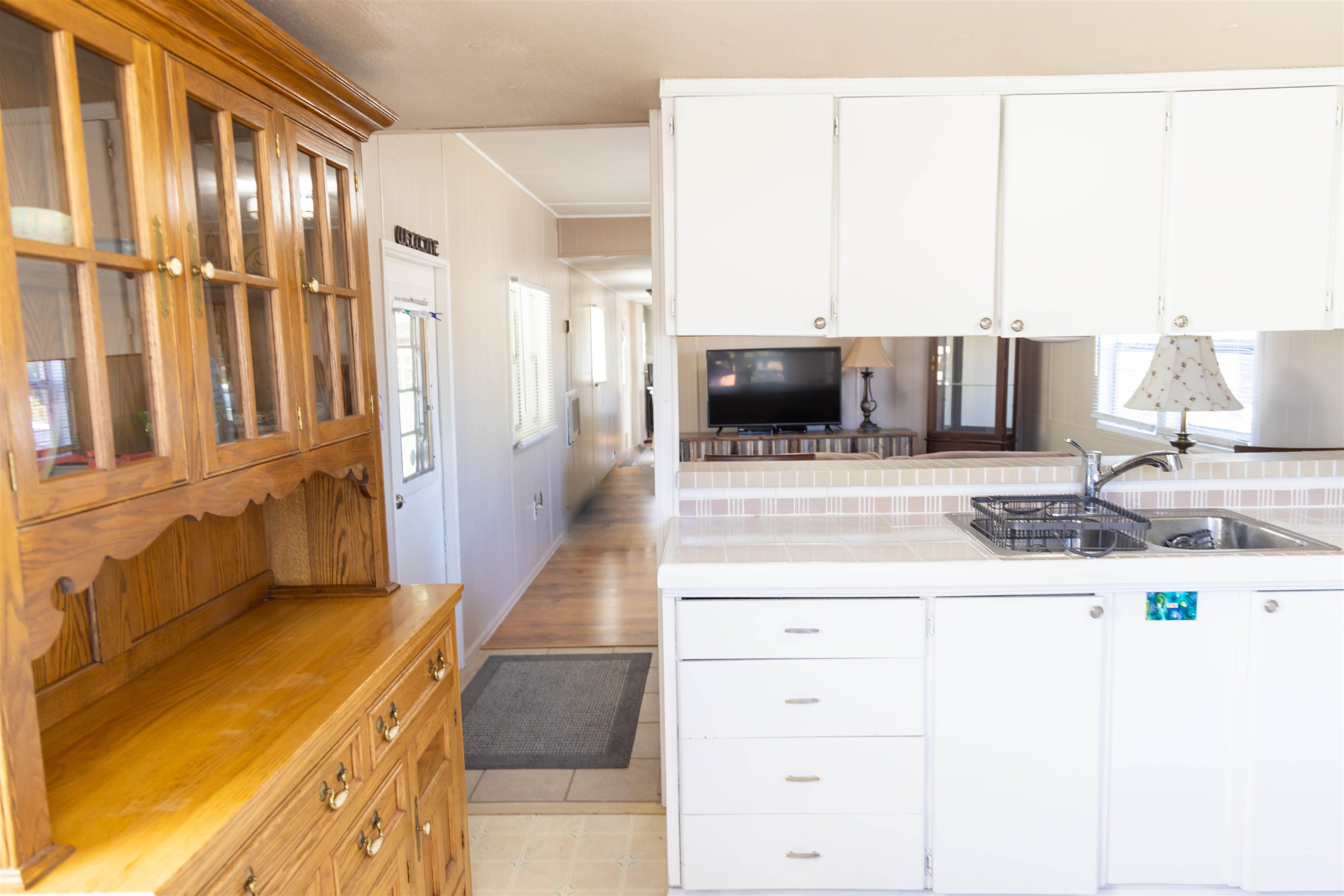 585-25 25 1/2 Road, Unit 232 Grand Junction, CO 81505 - Photo 10 of 40 a kitchen with stainless steel appliances a stove a sink and a microwave