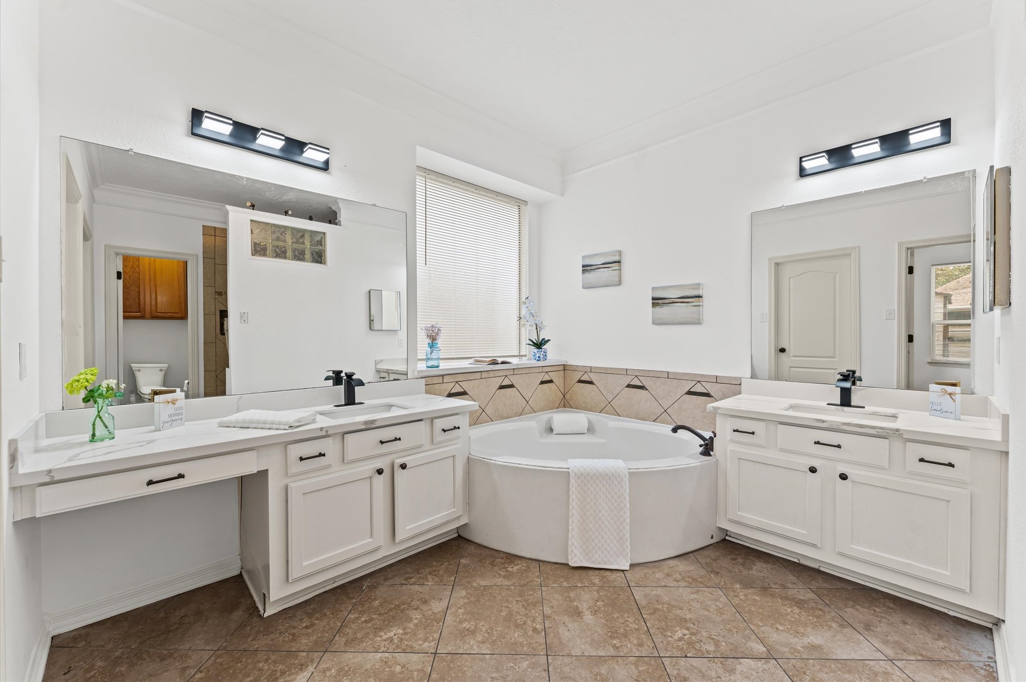 23827 Spring Dane Drive Spring, TX 77373 - Photo 17 of 36 a spacious bathroom with a double vanity sink mirror and bathtub