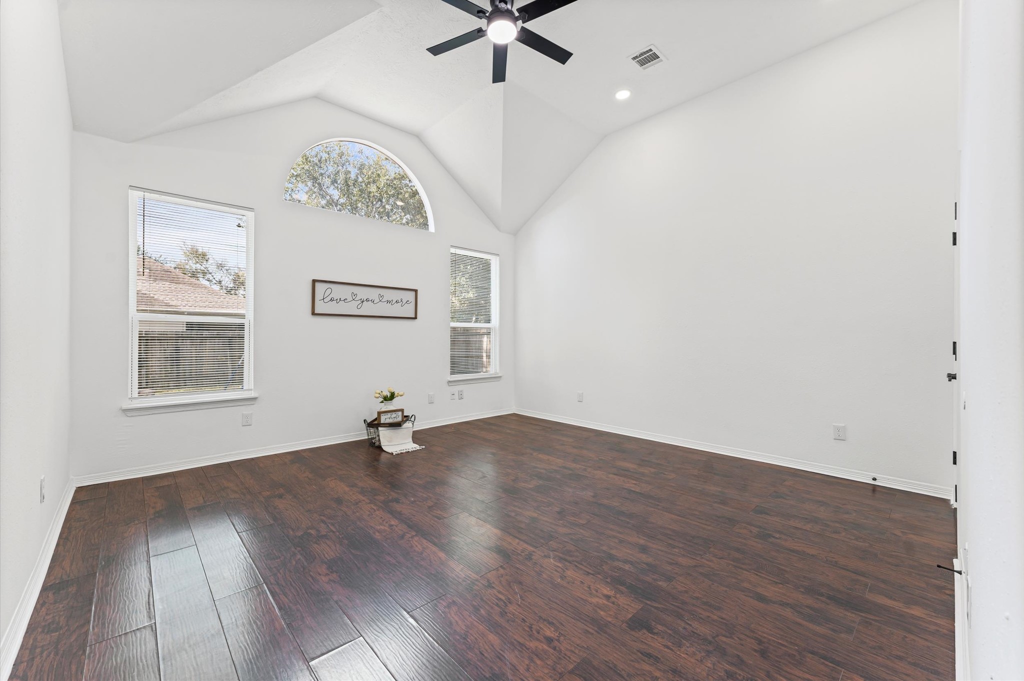 23827 Spring Dane Drive Spring, TX 77373 - Photo 19 of 36 a view of an empty room with window and wooden floor