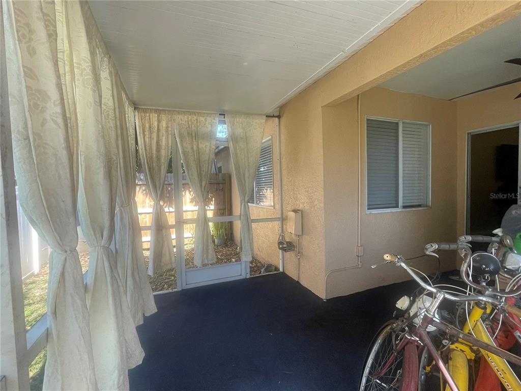 6980 Ulmerton Road, Unit 3G Largo, FL 33771 - Photo 41 of 52 a view of a livingroom with furniture and a window