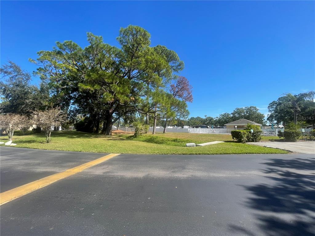 6980 Ulmerton Road, Unit 3G Largo, FL 33771 - Photo 47 of 52 a view of a playground with basketball court
