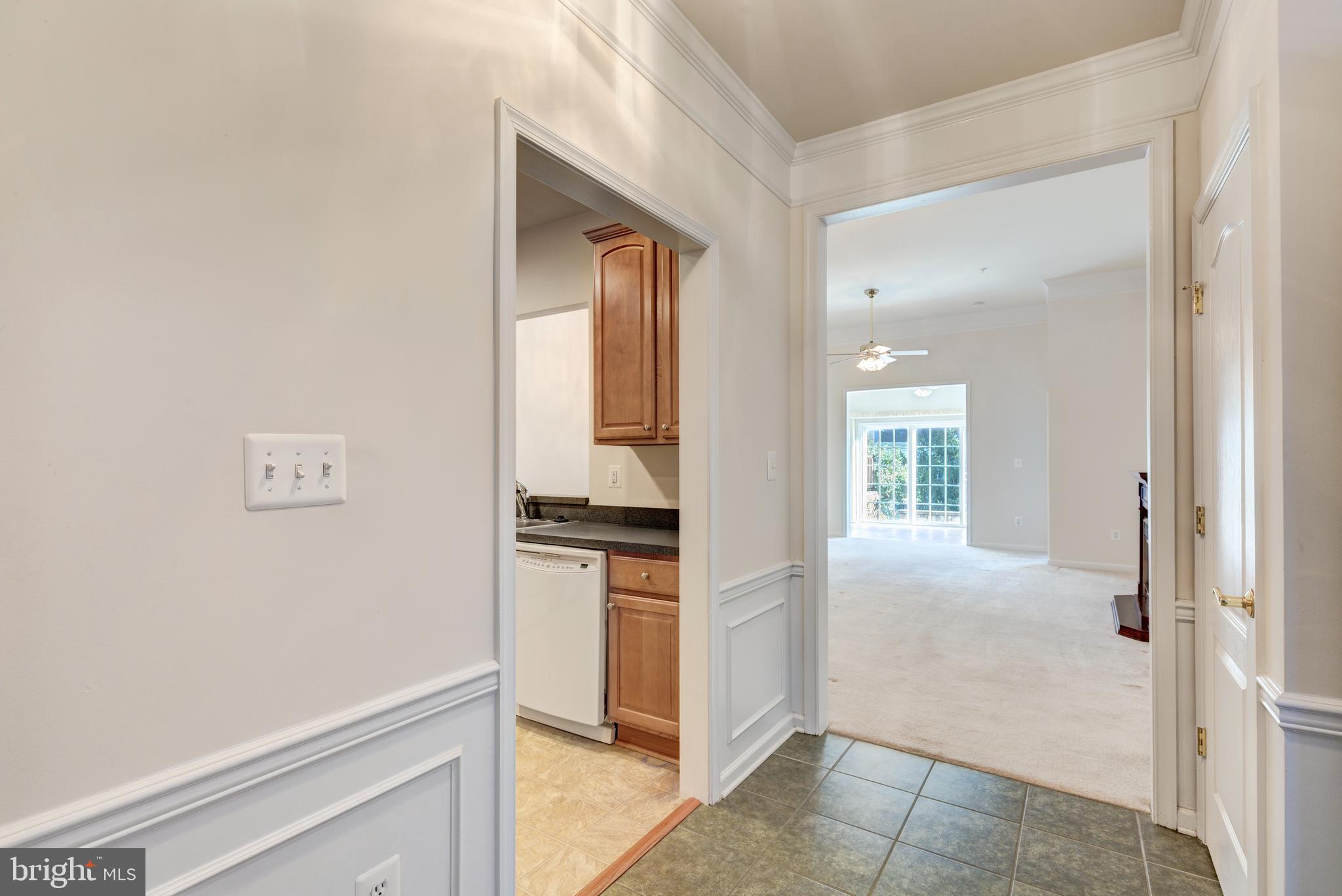 172 Saddletop Drive, Unit 364 Taneytown, MD 21787 - Photo 11 of 38 a view of a kitchen cabinets and a refrigerator