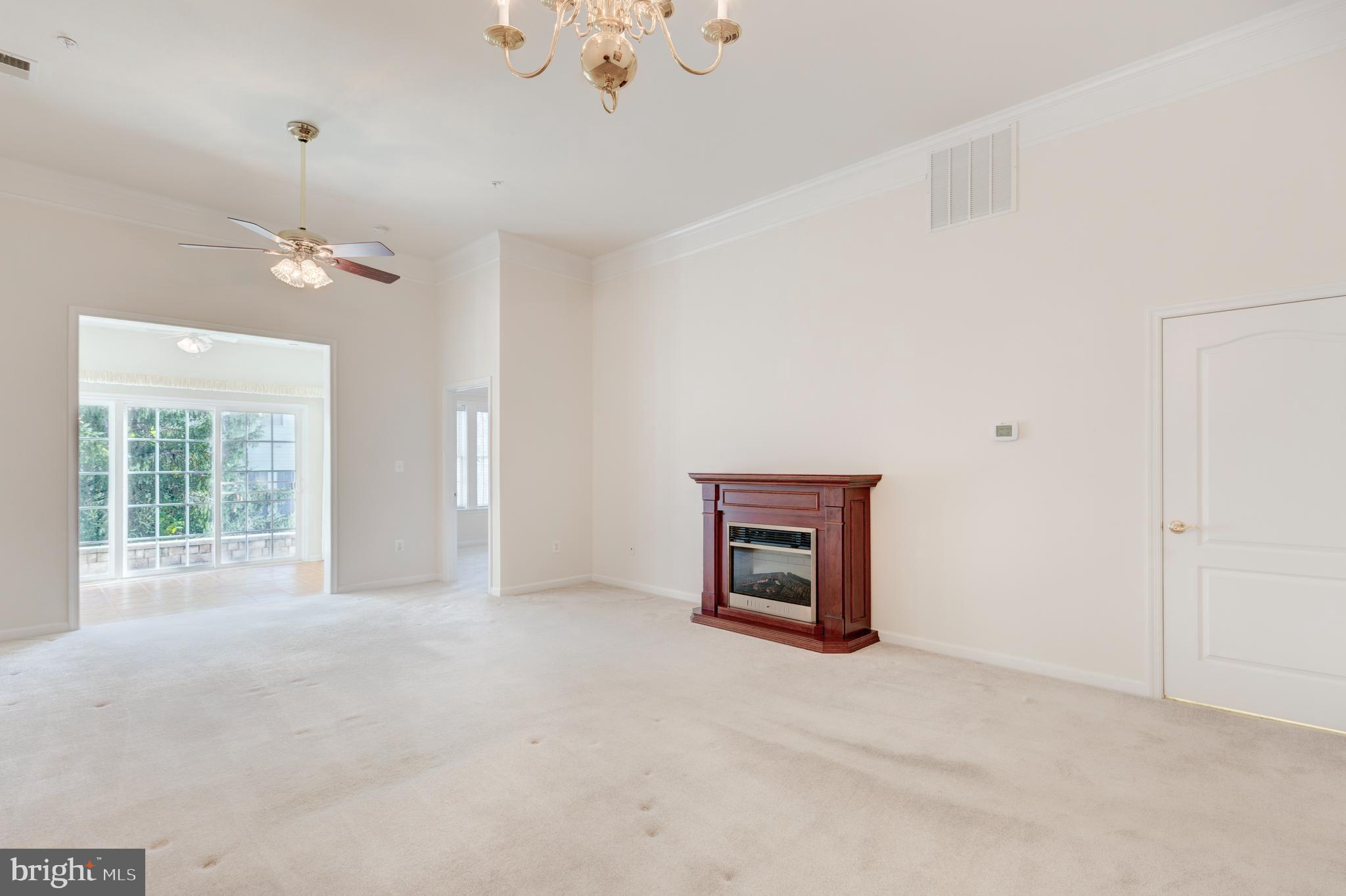172 Saddletop Drive, Unit 364 Taneytown, MD 21787 - Photo 20 of 38 a view of a livingroom with a fireplace