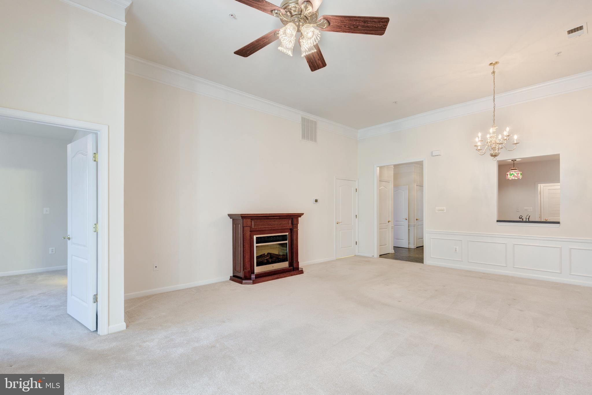172 Saddletop Drive, Unit 364 Taneytown, MD 21787 - Photo 21 of 38 a view of an empty room with a fireplace