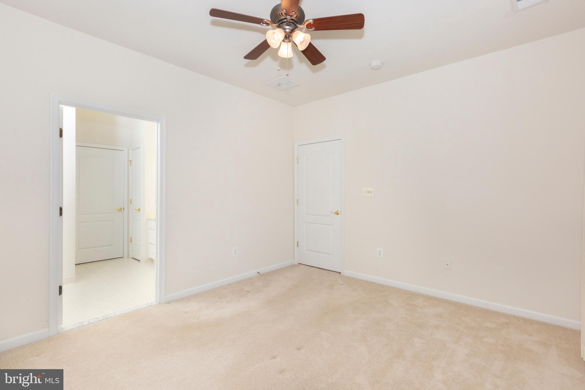 172 Saddletop Drive, Unit 364 Taneytown, MD 21787 - Photo 26 of 38 an empty room with chandelier fan