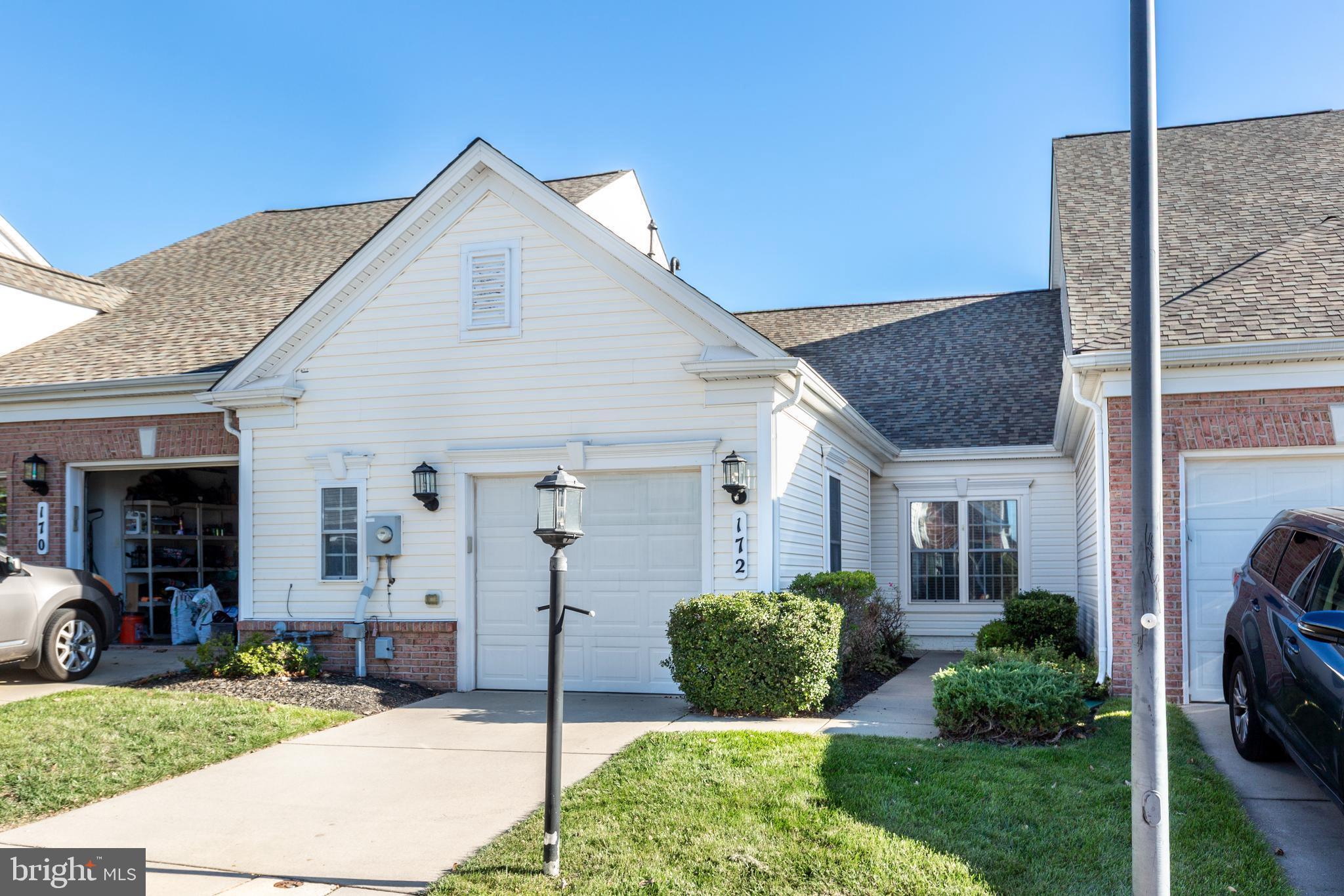172 Saddletop Drive, Unit 364 Taneytown, MD 21787 - Photo 3 of 38 a view of a house with backyard porch and garden