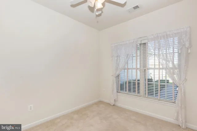 an empty room with a bathroom